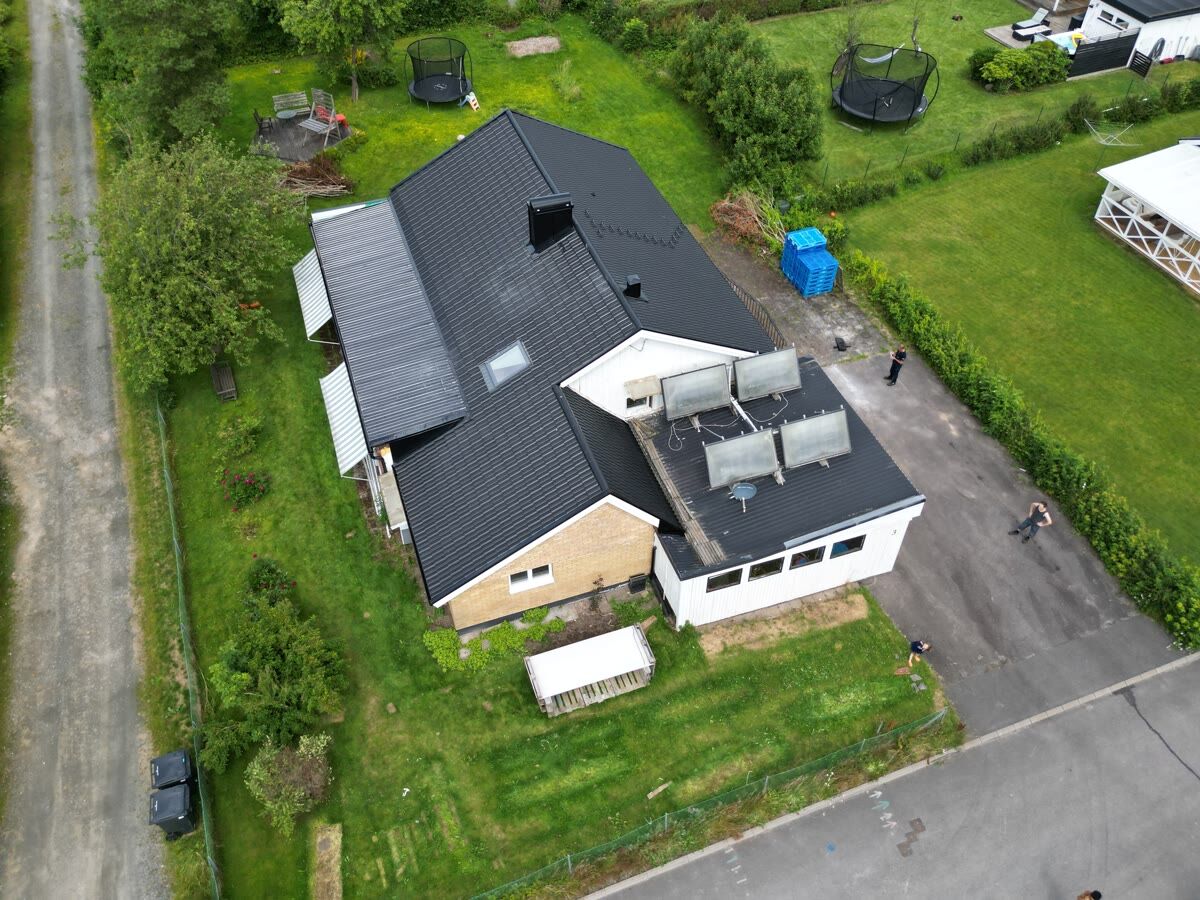 Takbyte – takarbete av Skandinaviska Takgruppen i Borås